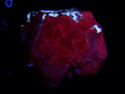 Ruby crystal under longwave UV light