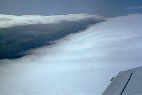 lenticular over a long ridgeline