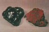 Two varieties of hematite: botryoidal and earthy.