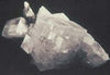 Calcite. Note rhombic cleavage.