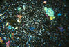 Basalt, microphenocrysts of olivine set in a fine-grained matrix, Chilcotin         Group, B.C..