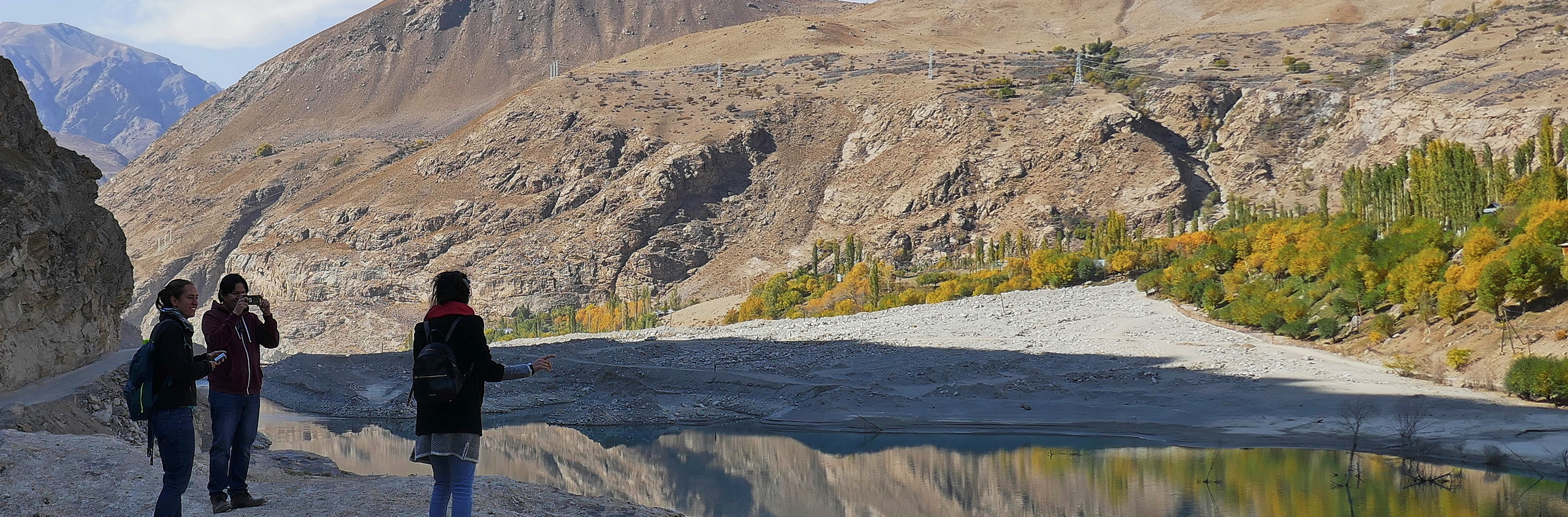 Mountainous region natural hazards: a major debris flow blocks a river and threatens a village in the Pamir Mountains, Tajikistan. Photo F. Jones.