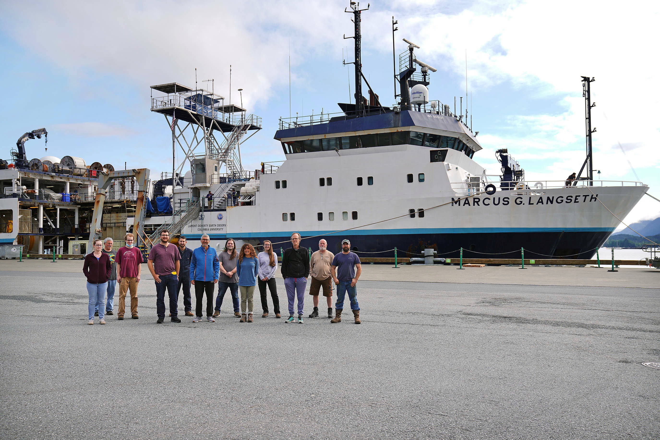 Science team and technical team in front of the Marcus G. Langseth. Pictured: Andrew Barclay, Pete Liljegren, Hannah Brewer, Chris Carchedi, Geena Littel (UBC EOAS), Katie Bosman, Charlie Kleindins, Josh Kassinger, Todd Jensvol, Michael Bostock (UBC EOAS), and Mladen Nedimovic (Dalhousie University). A team of ocean bottom sensor technicians are also on board. Credit: Dustin Safranek